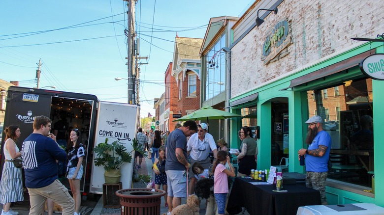 people gathered outside a restaurant