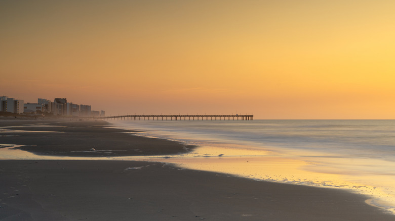Springmaid Beach and pier at the south end of Myrtle Beach's Grand Strand at sunrise