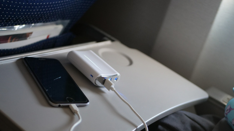 Charging a phone before getting on a plane