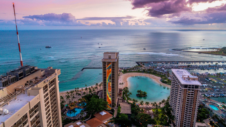 Waikiki Beach's Hilton Resort and Rainbow Tower, standing 300-feet tall, can be seen from above