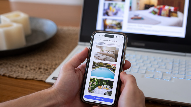 A traveler searches for hotels on a phone app