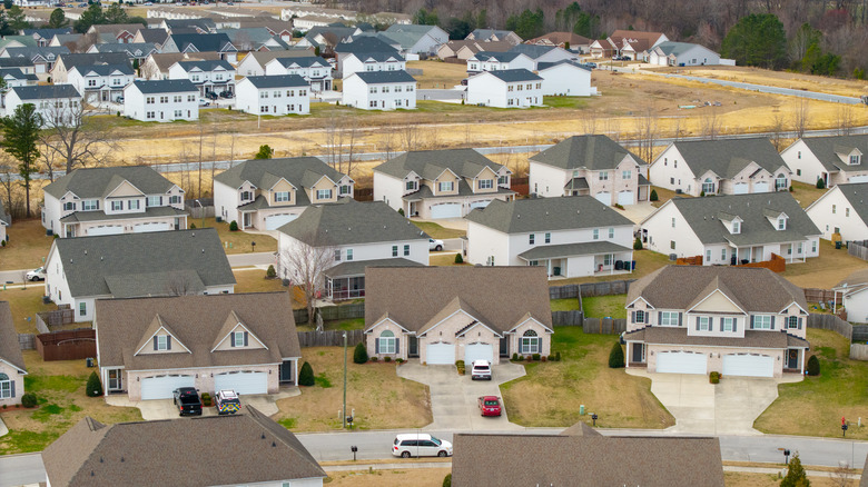 A residential development in suburban North Carolina shows uniform house designs