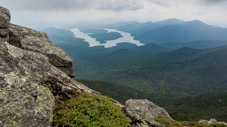 Rocks and green mountains in the High Peaks Wilderness, New York
