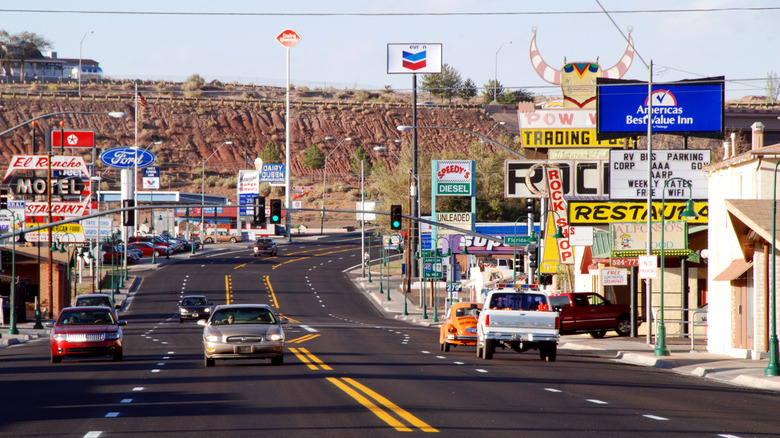 Holbrook's main street with retro signs and cars.