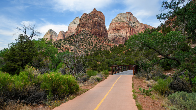 A bike path leads into rugged mountains in Utah