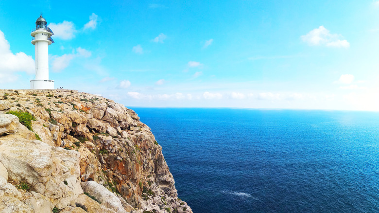 Cap da Barbaria lighthouse over blue sea