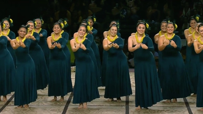Women dancing hula at the Merrie Monarch Festival competition