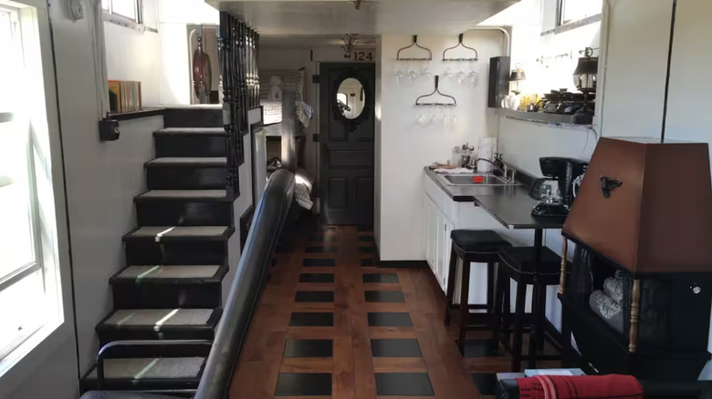 Stairs and kitchen area in tiny home