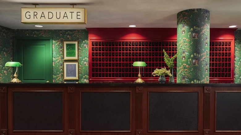 The reception desk at Graduate by Hilton Providence, a historic hotel in Rhode Island