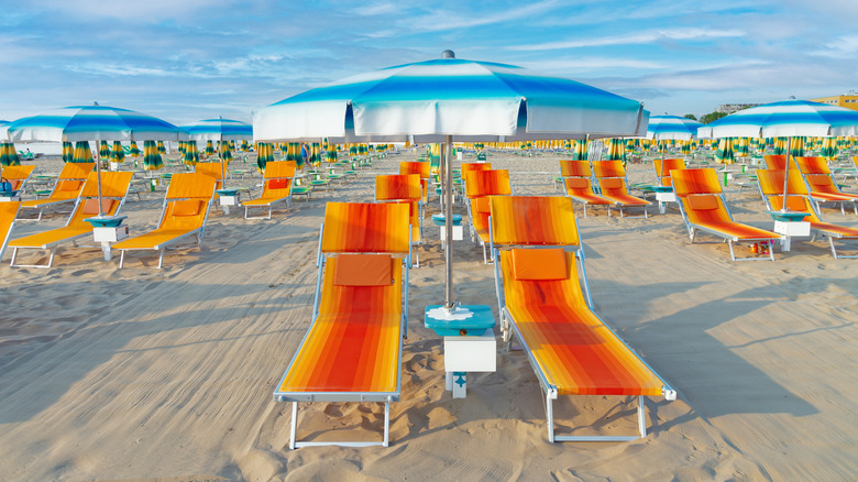 chairs and umbrellas on the beach in Rimini, Italy