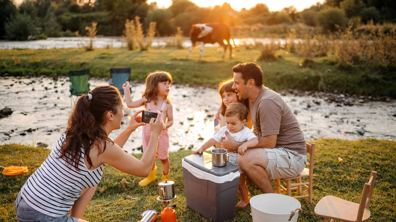 Family having a picnic by the lake