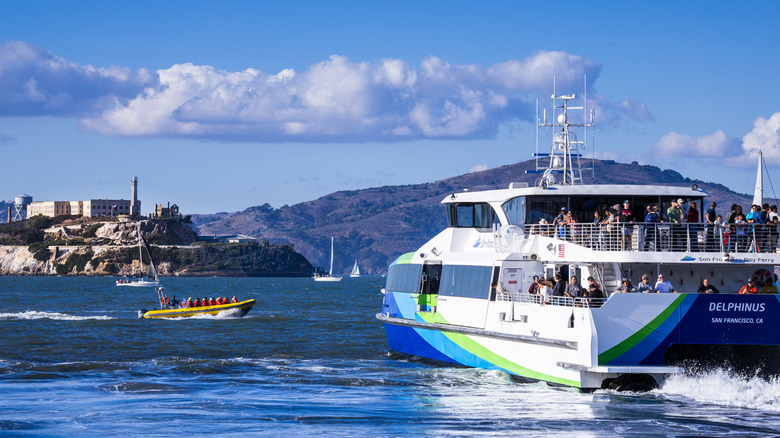 View of a ferry cruising in San Francisco Bay with Alcatraz Island in the background