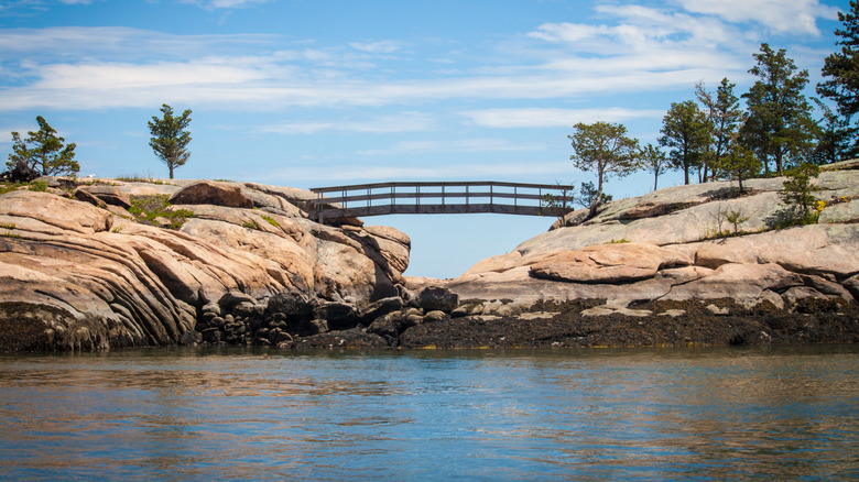 Thimble Island shown to the public from a boat ride tour over water