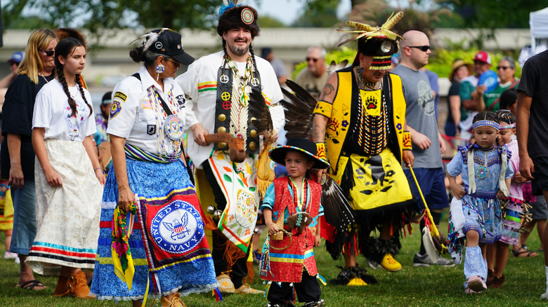 Attendees at an intertribal powwow