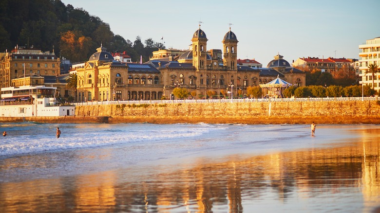 Golden beach with town behind