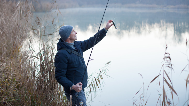 Man fishing on lake