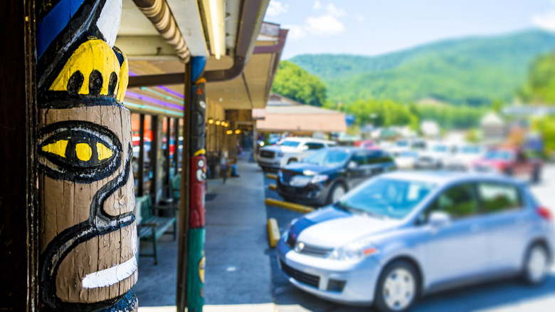 Traditional Cherokee totem pole in front of stores in Cherokee, North Carolina