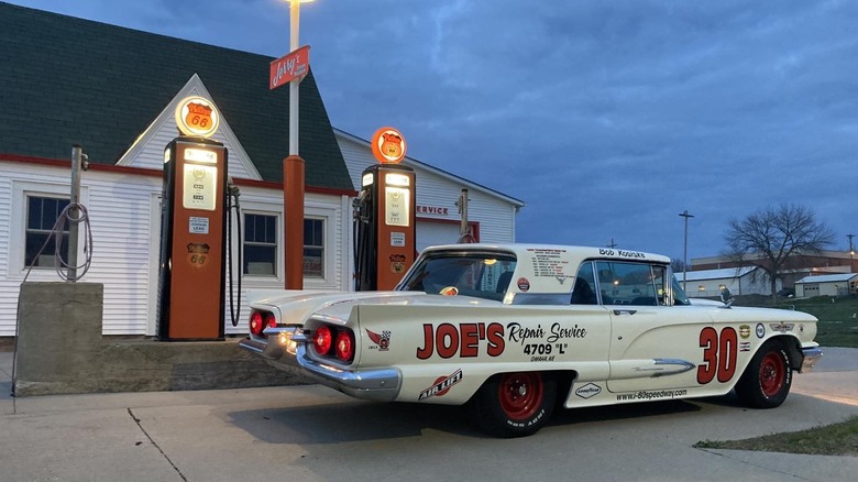 A car and gas pumps at Jerry's Dream Museum