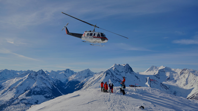 Tourists picked up by a helicopter in the Rocky Mountains