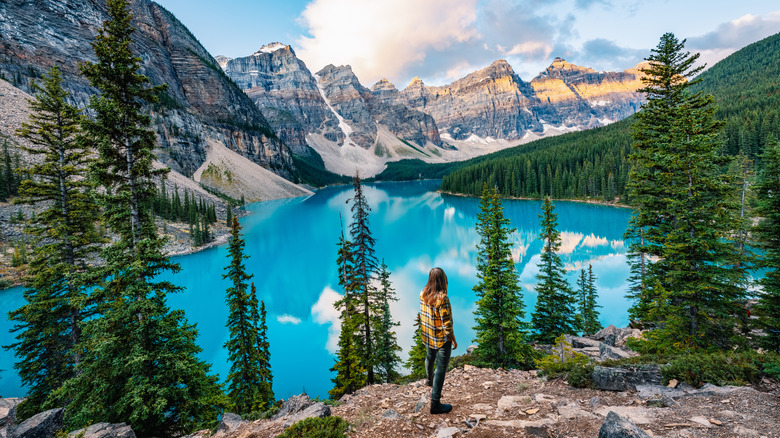 Person overlooking Moraine Lake in Alberta