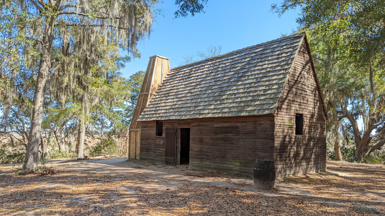 A house made of wood in the original settlement of Charles Towne Landing State Historical Site.
