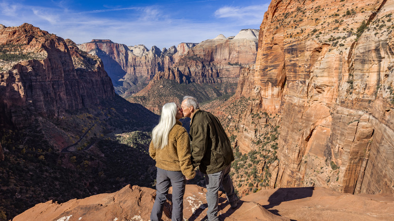 Senior couple kissing in Zion National Park