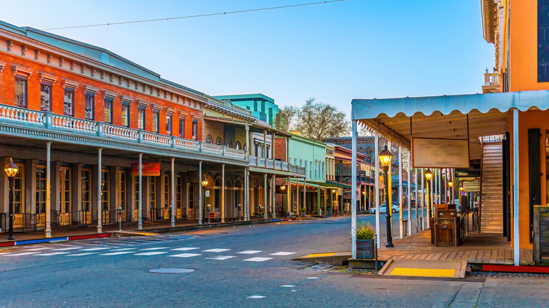 Colorful buildings and verandahs line a street in the historic center of Sacramento, California