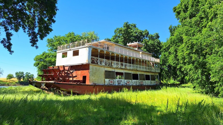 The riverboat Spirit of Sacramento stands in a meadow on a sunny day outside of Sacramento, California
