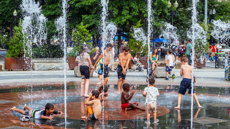 Children playing in fountain in the Rose Kennedy Greenway, Boston