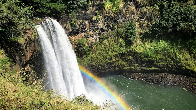 Rainbow over twin waterfalls