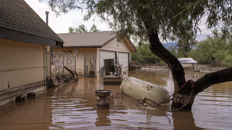 A home half-submerged in water after a flash flood in Roosevelt, Arizona