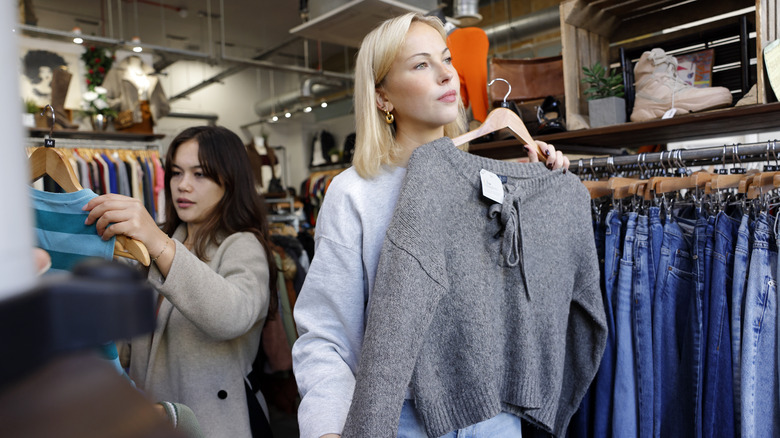 Two women browsing a vintage shop