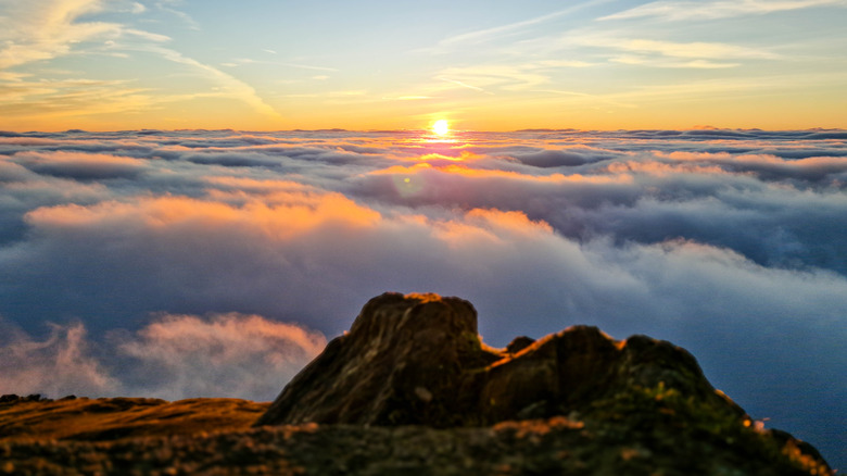 sun rays and clouds at the summit of Snowdon, Wales