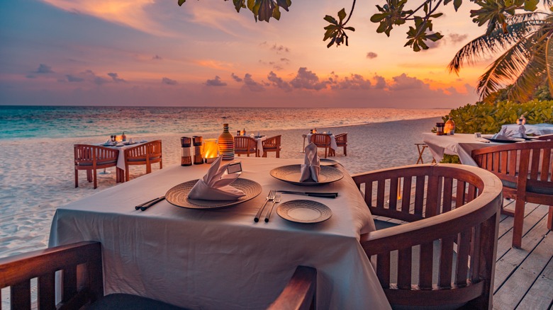 resort beach restaurant at sunset