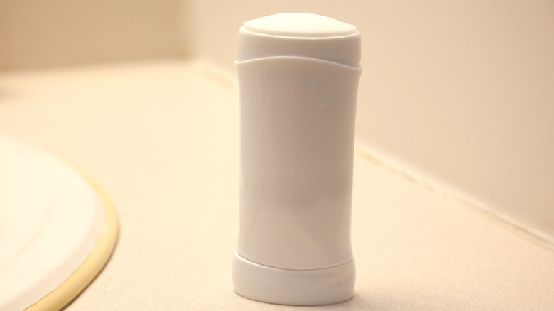 A white stick of deoderant displayed on a white background