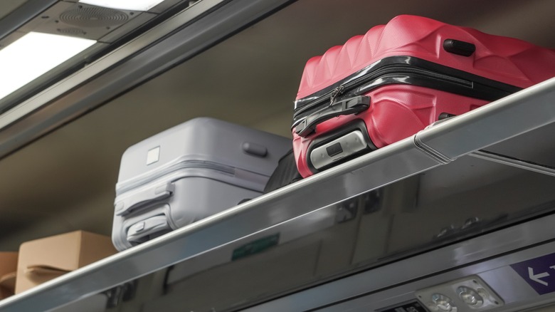 Luggage in the overhead bin of an airplane