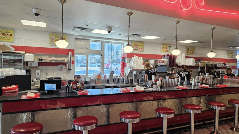 Red vinyl stools at the counter of Elliston Place Soda Shop