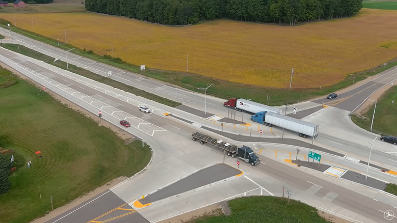 Trucks driving through an RCUT intersection