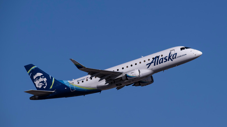 An Alaska Air plane in the air