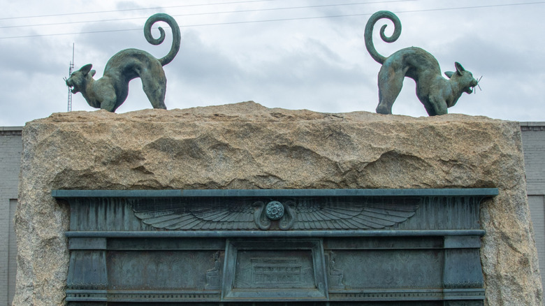 Black cat statues on the Hoo-Hoo Monument in Gurdon, Arkansas