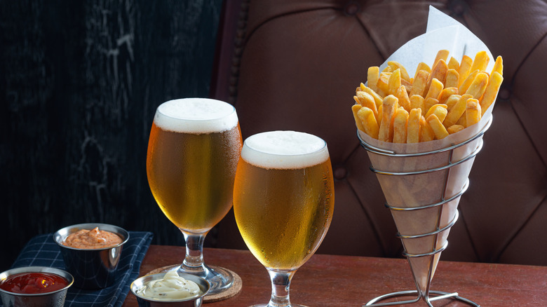 Belgian fries and beer on a table