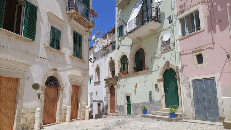 Old town area with small square with ancient buildings in Rodi Garganico, Italy