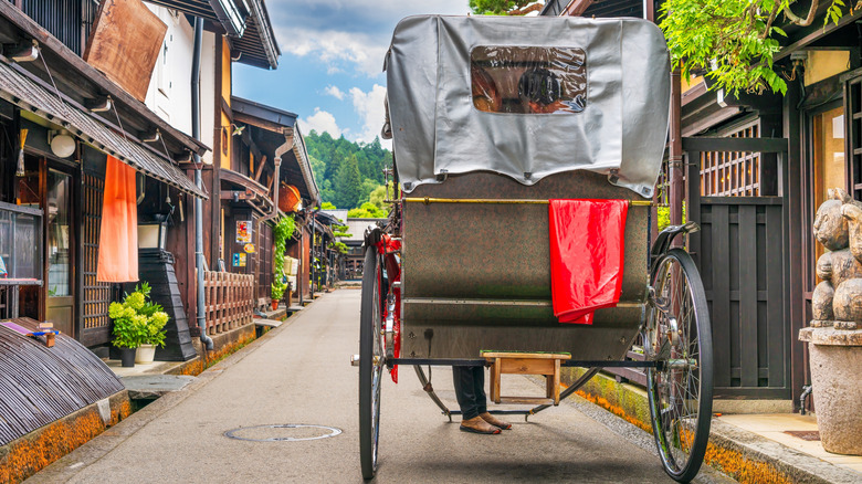 A rickshow in the historic Sannomachi Street in the old town of Takayama, Japan