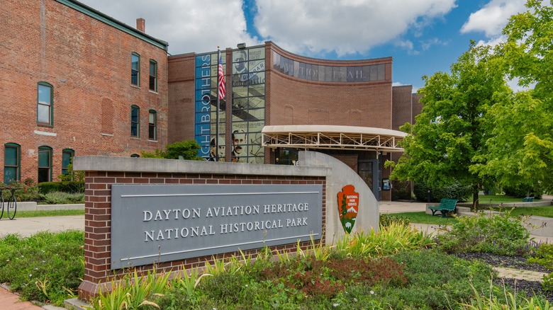 Sign outside brick museum building of dayton aviation heritage national historical park