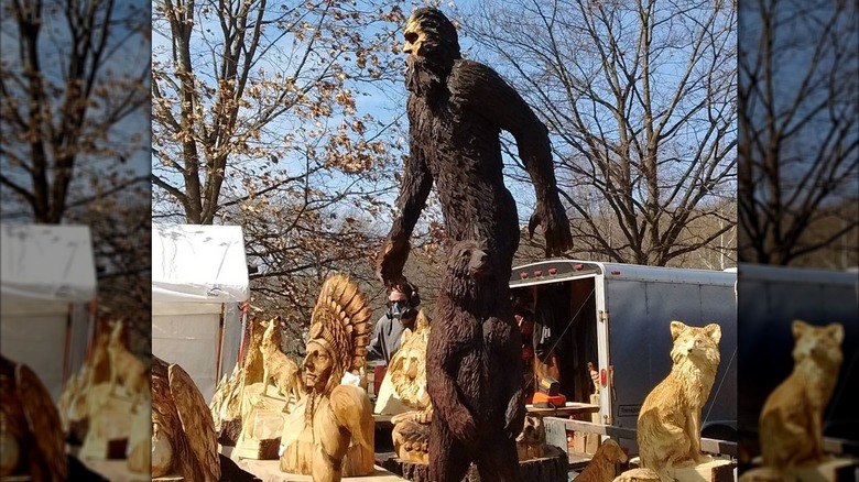 Wood carvings on display outdoors