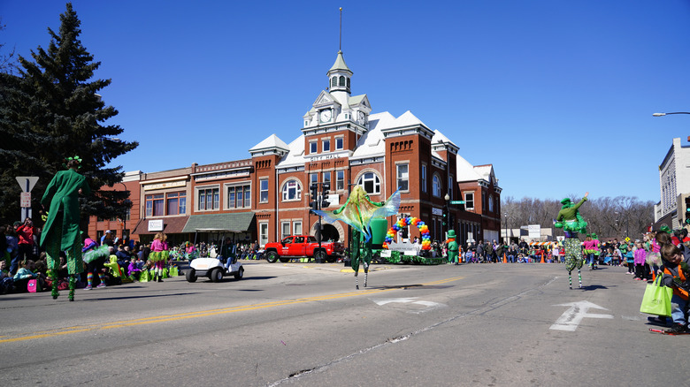 People on stilts in New London during St Patrick's Day