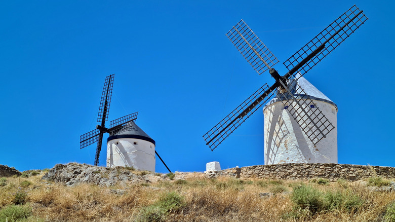 The iconic windmills of La Mancha standing on a hill