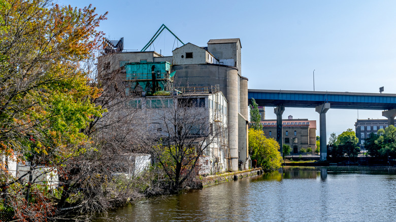 Industrial building near a bridge beside the Menomonee River in Walker's Point