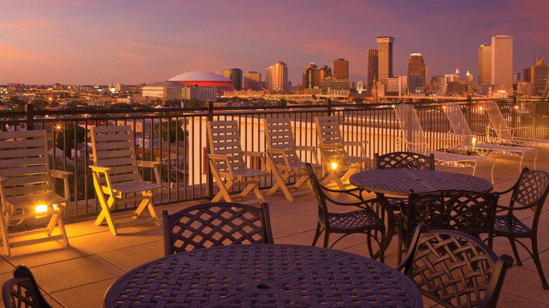 Rooftop deck at sunset at Avenue Plaza Resort, in the Garden District of New Orleans, Louisiana