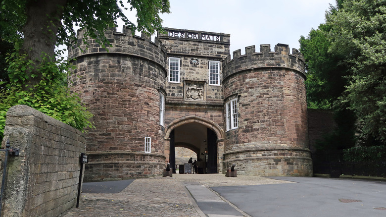 Impressive stone gatehouse with turrets at Skipton Castle